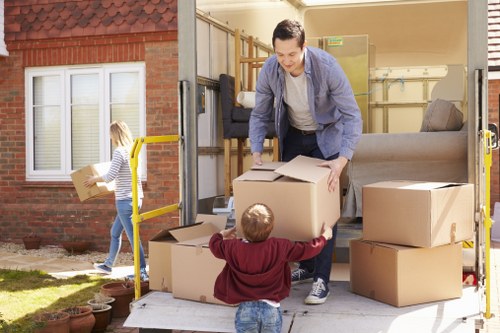 Local movers working near a Canary Wharf apartment building