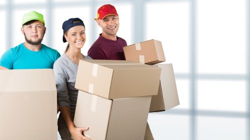 Unpacking boxes in a modern Canary Wharf home or office