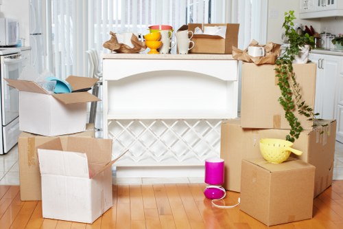 Loading boxes and furniture into a moving van for a Docklands move