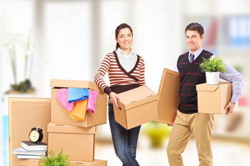 Moving van and boxes prepared for a Canary Wharf flat relocation
