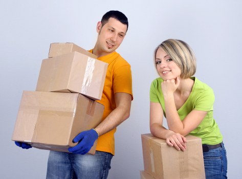 Packed moving boxes ready for local van removal in Canary Wharf