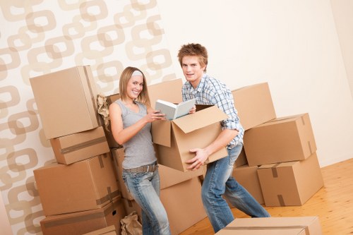 Loading boxes and furniture into a removal van in Canary Wharf