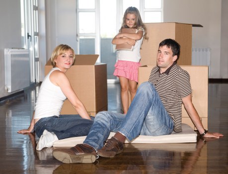 Removal van loading furniture in Canary Wharf local area